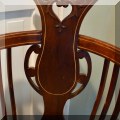 F42. Antique round chair on casters. 37&rdquo;h x 22&rdquo;w x 20&rdquo;d 